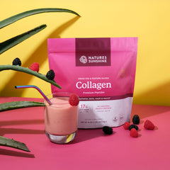 Nature's Sunshine collagen powder scoop ready for daily use.