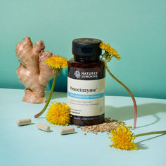 Nature's Sunshine Proactazyme capsules with water for easy use after meals