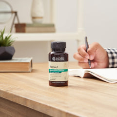 Nature's Sunshine Stress-J capsules close-up showing easy-to-swallow form.