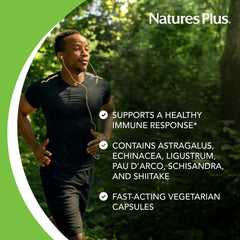 Bottle and glass with NaturesPlus Immune Action suggesting daily wellness rituals
