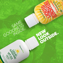 NaturesPlus Liquid Sunshine D3 dropper demonstrates precise dosing for calcium absorption support.