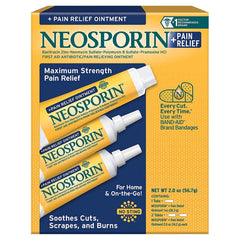Close-up of Neosporin Original tubes on a clean surface for minor wound care.