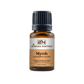 Nirvana Nurture Myrrh oil bottle closeup illustrating purity for calm and skin care.