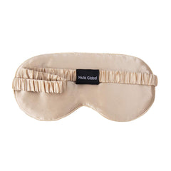 NMM Global mulberry silk sleep mask champagne close-up fabric texture