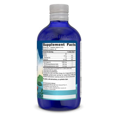 Pouring Nordic Naturals Arctic Cod Liver Oil Lemon from the bottle.