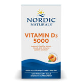 Nordic Naturals Vitamin D3 5000 orange mini soft gels pour for daily bone support