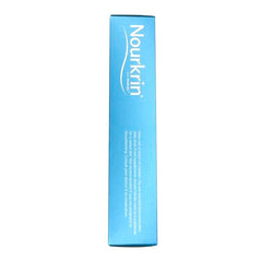 Nourkrin Woman capsules in hand for easy, drug-free hair support.