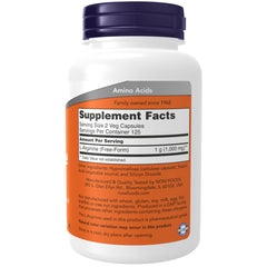 NOW Foods L-Arginine capsules close-up showing 500 mg dose