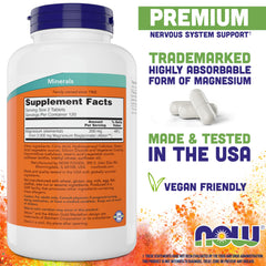 Close-up of NOW Foods Magnesium Glycinate tablets showing a smooth, easy-to-swallow form