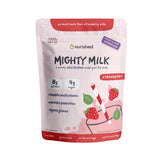 Nurished Mighty Strawberry Milk being poured into a glass for a kid-friendly protein boost