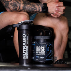 NutraBio Base Pre-Workout bottle 30 servings showing sugar-free formula for clean energy.