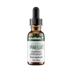 NutraMedix Pinella liquid drops bottle closeup showing anise aroma for cognitive support