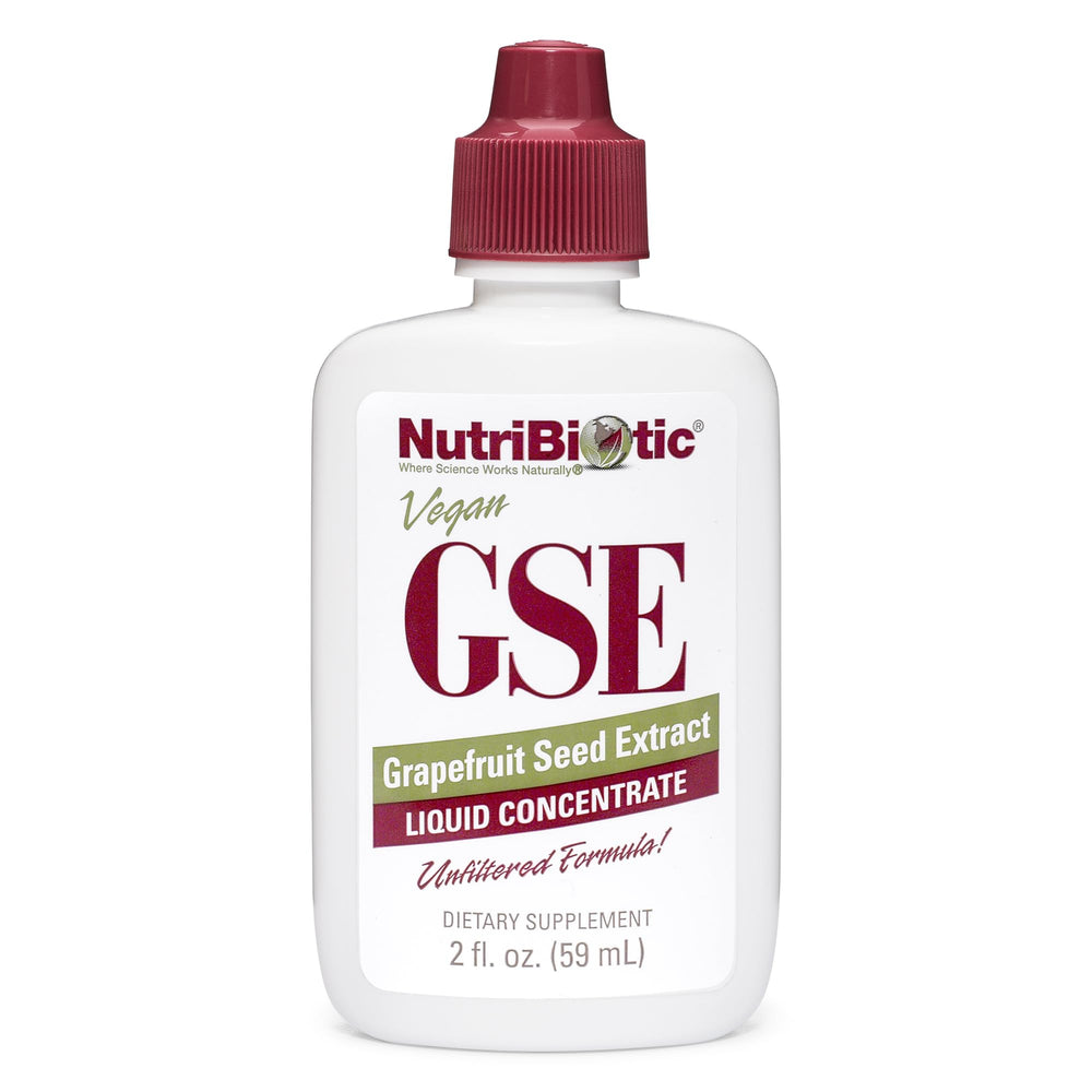 NutriBiotic GSE bottle pour demonstrates compact 2 oz size for daily immune support.