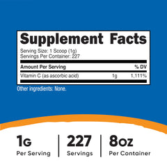Nutricost Ascorbic Acid Powder scoop included for precise 1 g servings.