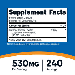 Close-up of Nutricost Cayenne Pepper 530mg capsules highlighting 40,000 heat units.