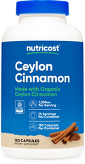 Nutricost Organic Cinnamon capsules bottle sits on a kitchen counter for daily supplementation.