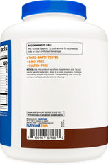 Nutricost grass-fed whey isolate chocolate scoop beside a shaker bottle for fast mixing