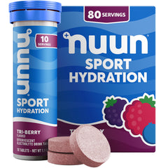 Nuun Sport Tri-Berry tablet dissolving in water for quick on-the-go hydration.