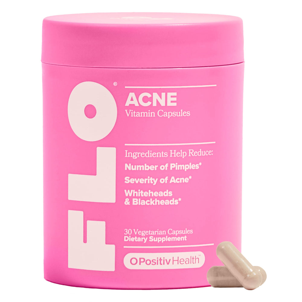 O Positiv FLO Acne bottle closeup shows premium ingredients for skin support.
