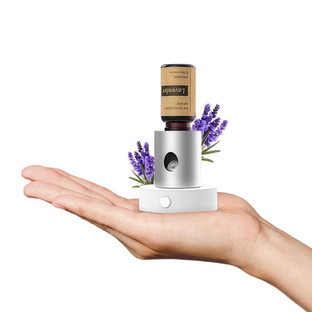 Olxasw mini diffuser with lavender oil delivering pure aromatherapy mist for home or travel.