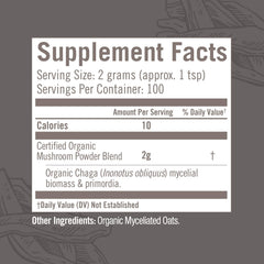 Scoop of OM MUSHROOM SUPERFOOD Chaga powder for daily use