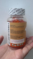 On Greenvita Magnesium Glycinate Gummies close-up of orange chews.