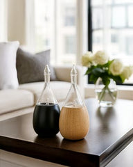 Organic Aromas Raindrop 2.0 diffuser, glass nebulizer close-up delivering pure essential oil particles.