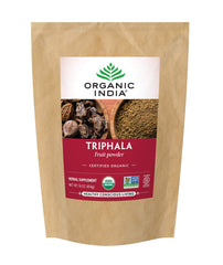 Organic India Triphala powder bag highlighting the three-fruit blend for gentle digestion.
