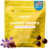 Organifi Happy Drops bottle close-up showing mood-boosting gummy texture and design.