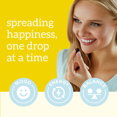 Organifi Happy Drops packaging front highlighting vegan and gluten-free attributes.