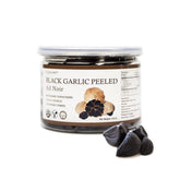 Orgnisulmte peeled black garlic cloves ready to eat for quick flavor boosts