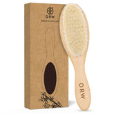 ORW OREN’S baby hair brush with wooden handle and soft bristles for gentle grooming.