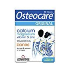 Osteocare bottle pour showing easy dosing for calcium intake.