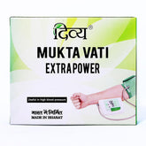 Patanjali Divya Mukta Vati bottle closeup showing 120 tablets for daily balance