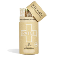 PATCH Tan Bamboo Bandage sterile 0.75x3 applied to finger for protection
