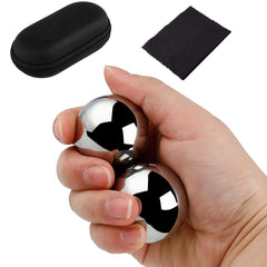 Phaicoilo Chinese Baoding Balls in hand for therapy and dexterity.