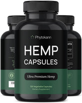Phytokann hemp oil capsules bottle on a wood surface suggesting daily calm and wellness