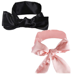 Pimoys satin eye-mask in black showing soft light blocking for travel sleep.