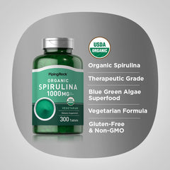 Piping Rock Spirulina tablets close-up showing vegetarian formula.
