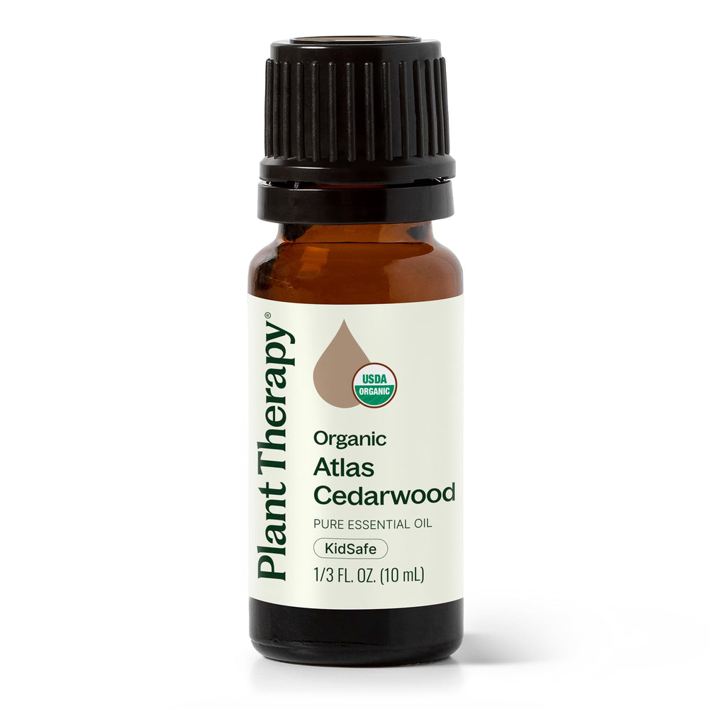 Plant Therapy Atlas Cedarwood essential oil diffuser bottle emits a warm woody aroma for diffusion.