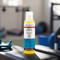 Plantlife Arnica Relieve Oil applied to tired muscles
