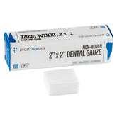 PlastCare USA 2x2 gauze pad close-up shows soft non-woven 4-ply texture for comfort.