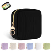 Playexen period bag in black corduroy, front view for discreet storage on the go and privacy.