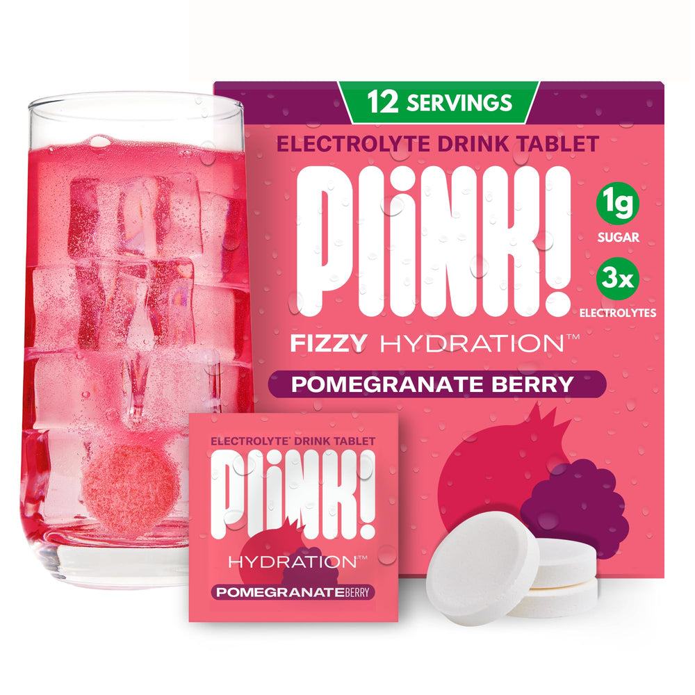 Plink! Pomegranate Berry fizzing electrolyte tablets in water for refreshing hydration.