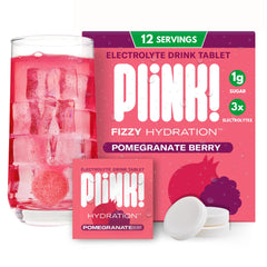 Plink! Pomegranate Berry fizzing electrolyte tablets in water for refreshing hydration.