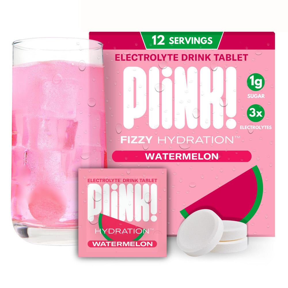 Plink Watermelon fizzy electrolyte tablet dissolving in water for refreshing hydration