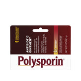 Polysporin first aid ointment tube close-up for minor wound protection.