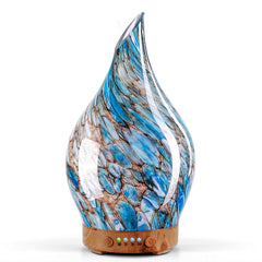 Porseme 150ml glass diffuser with starry globe pattern enhances bedroom ambiance.