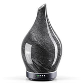 Porseme Obsidian diffuser with star cover adds calming décor for bedrooms.