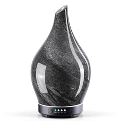 Porseme Obsidian diffuser with star cover adds calming décor for bedrooms.